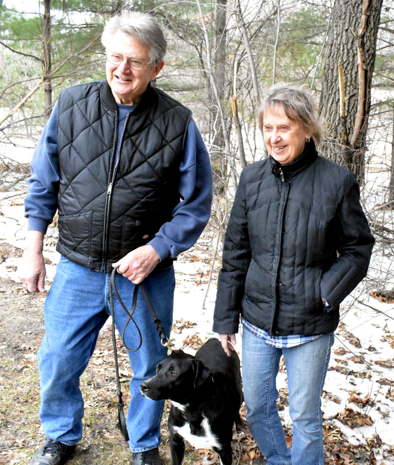 Adoptive owners take Lennon the lab home